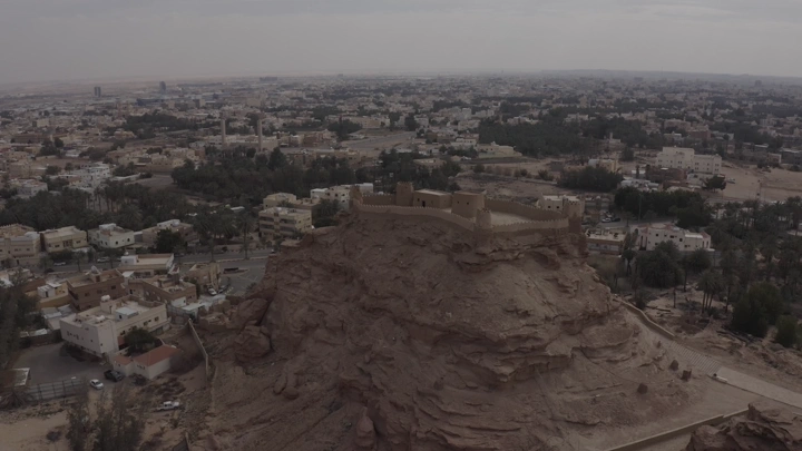 Za'abal Castle on a hill in Sakaka, daytime aerial shot.