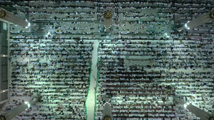 Prophet's Mosque crowded with worshippers, Medina, aerial shot.