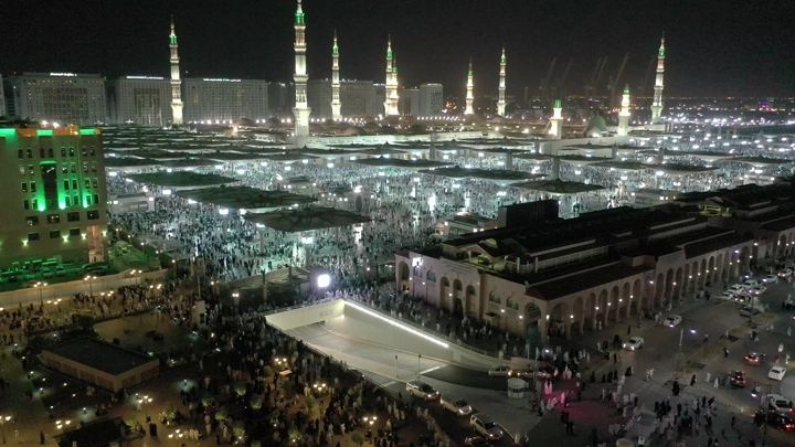 Prophet's Mosque in Medina at night, aerial shot.