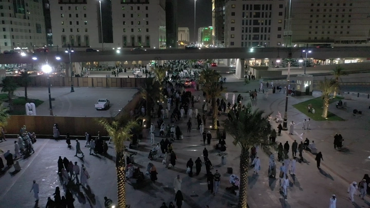 Crowd of people in Medina at night, aerial shot.