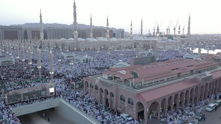 Prophet's Mosque in Medina, aerial shot at sunset.