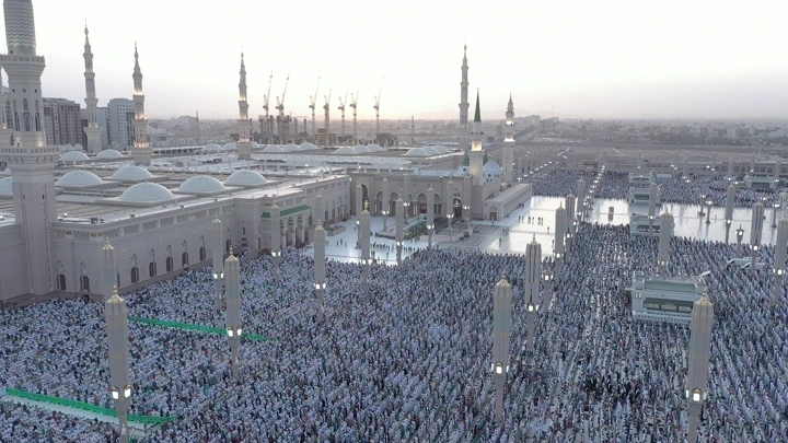 Prophet's Mosque in Medina, aerial shot at sunset.