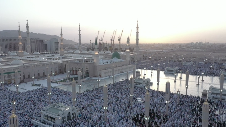 Prophet's Mosque in Medina at sunset, aerial shot.