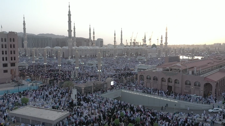 Prophet's Mosque in Medina at sunset, aerial view.