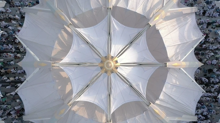 Umbrella at Al-Masjid an-Nabawi in Medina, aerial shot.