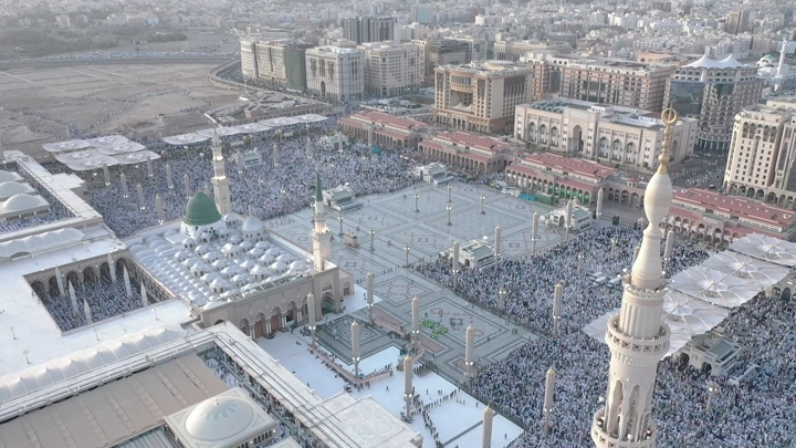 Prophet's Mosque in Medina, daytime aerial shot.