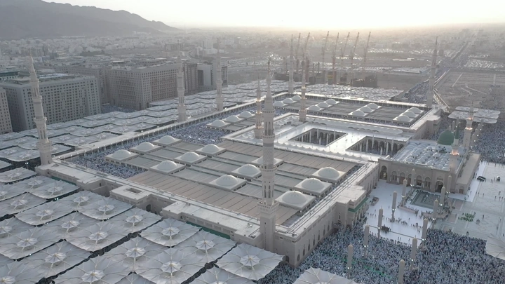 Prophet's Mosque in Medina at sunset, aerial view.