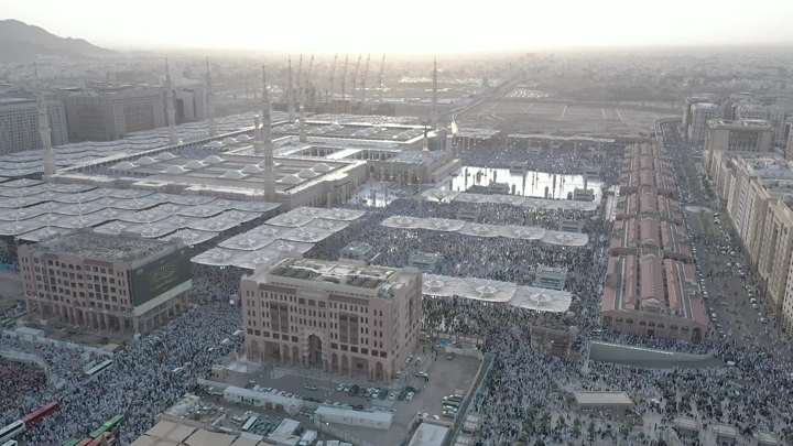 Prophet's Mosque in Medina at sunset, aerial view.