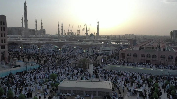 Prophet's Mosque in Medina at sunset, aerial view.