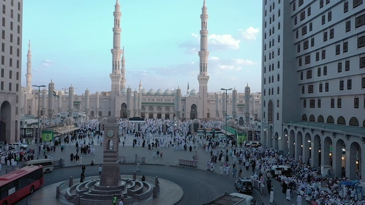 Prophet's Mosque in Medina, daytime aerial shot.