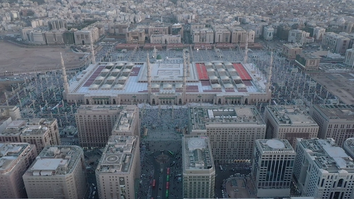 Prophet's Mosque in Medina, daytime aerial shot.