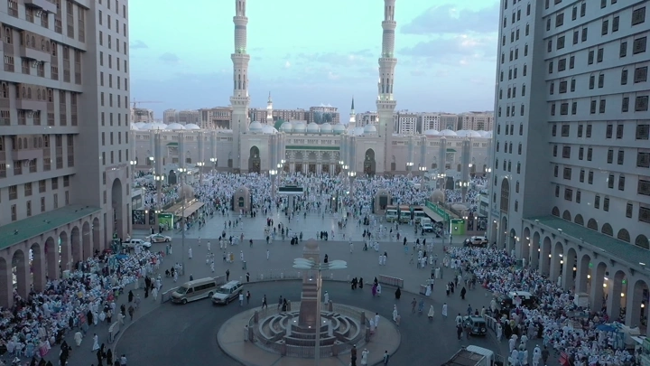 Prophet's Mosque in Medina at sunset, aerial view.