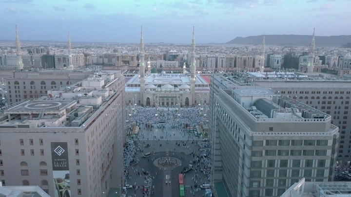 Prophet's Mosque in Medina at sunset, aerial view.