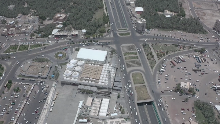 Aerial view of Quba Mosque in Medina, showing surrounding streets.