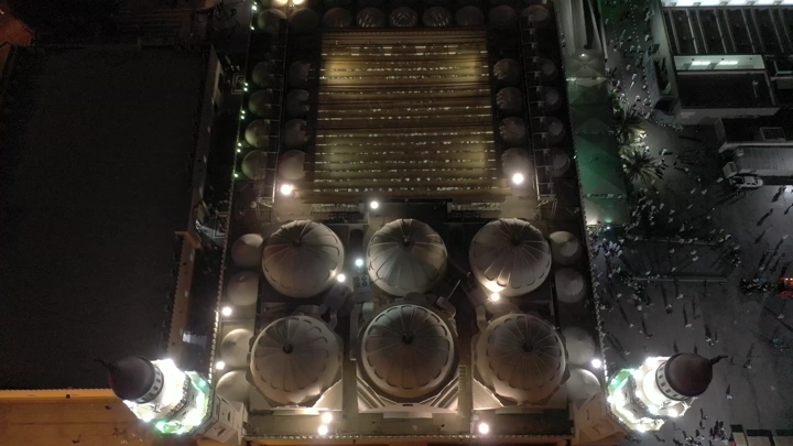 Quba Mosque in Medina at night, aerial shot.