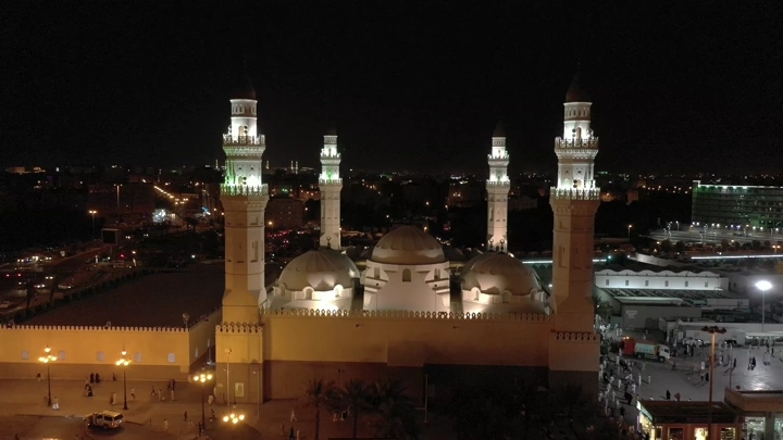 Quba Mosque in Medina at night, aerial shot.