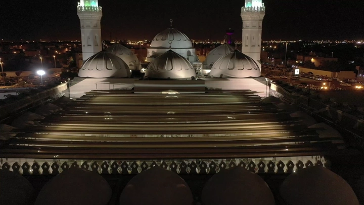 Quba Mosque in Medina at night, aerial shot.