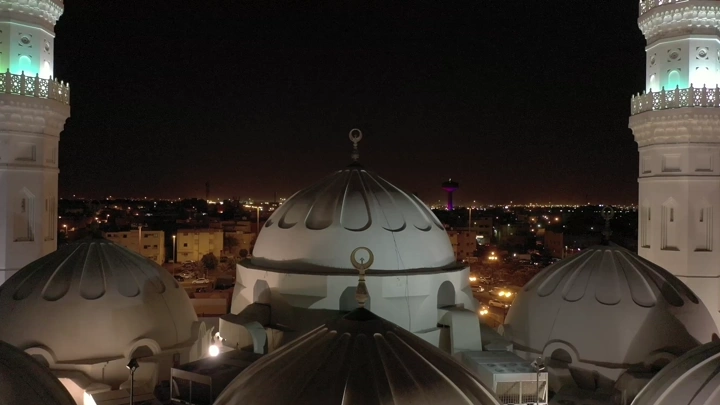 Quba Mosque in Medina at night, aerial shot.