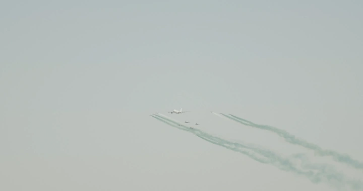 Planes in a national day airshow, distant shot.