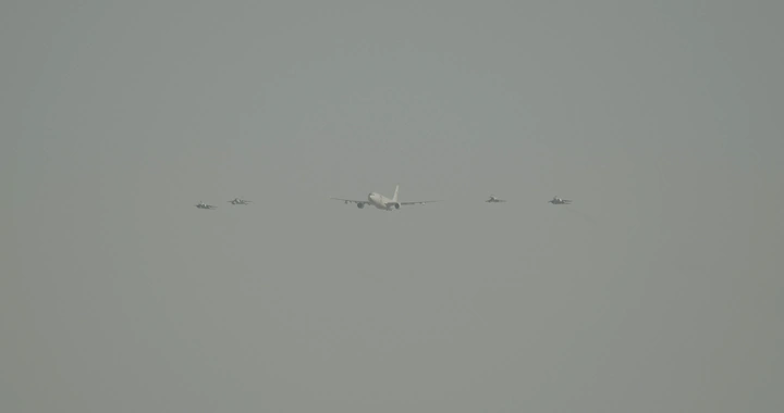 Aircraft formation in an airshow for National Day, rear shot.