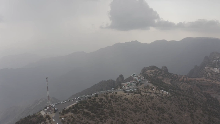 Aerial shot of Al-Sahab Park in Abha under the clouds, drone shot.