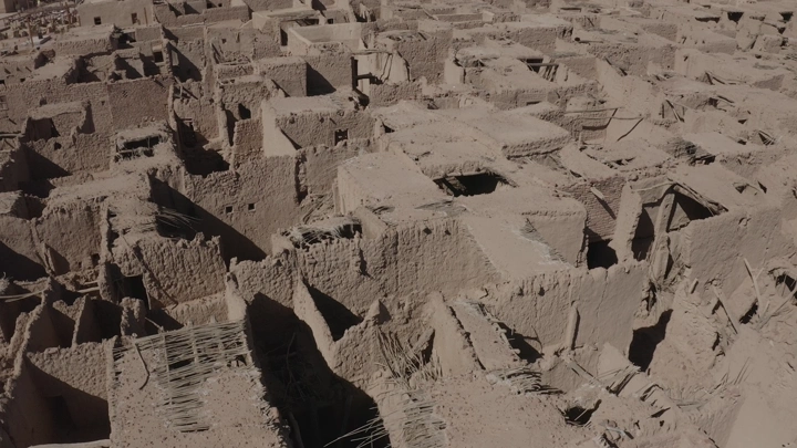 Ancient mudbrick houses in AlUla Old Town, aerial shot.