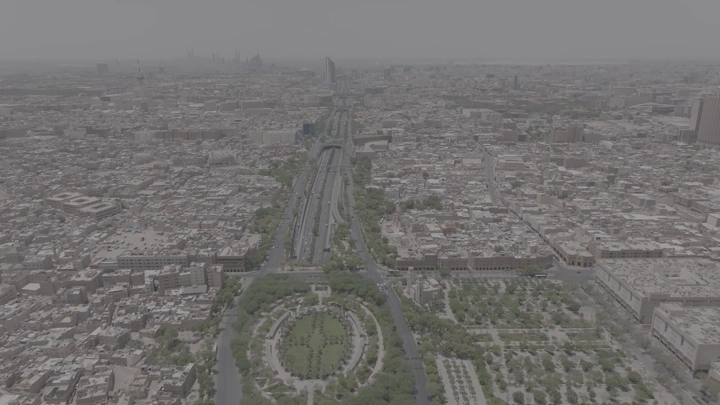 Aerial shot of Riyadh city with King Fahd Road Park, drone shot.