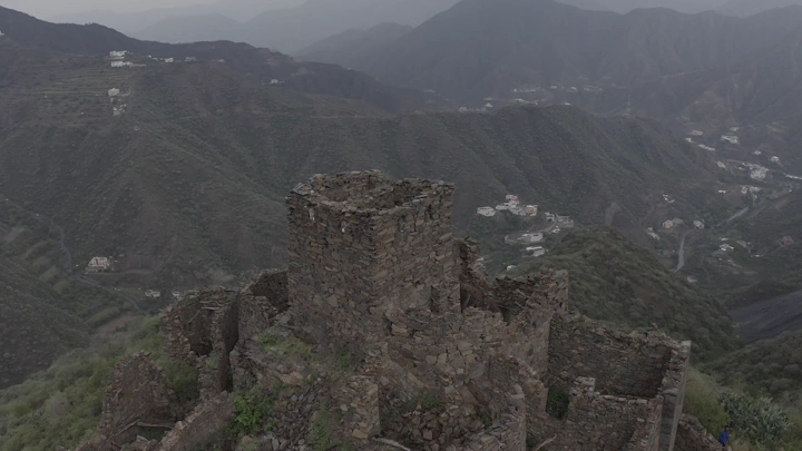 An old stone castle in Rijal Almaa in the Asir region, aerial shot.