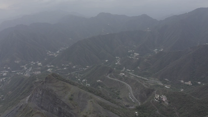 Aerial view of the mountains of Rijal Alma and their houses in the Asir region, drone shot.