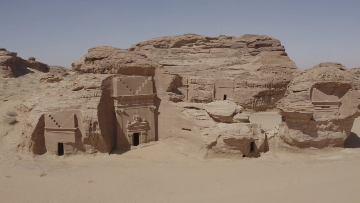 Mada'in Saleh in AlUla under clear sky, aerial shot.