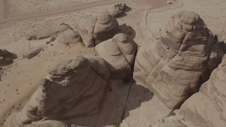 Rock formations in AlUla mountains, aerial view.