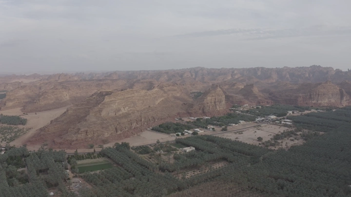Mountains and farms in AlUla from above, drone shot.