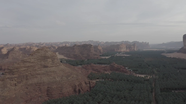 Mountains and farms in AlUla, Saudi Arabia, aerial shot.