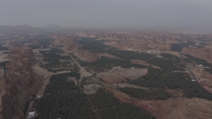 Mountains and farms of AlUla from above, aerial view.