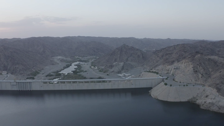 Bisha Valley Dam in Asir region, aerial shot at sunset.