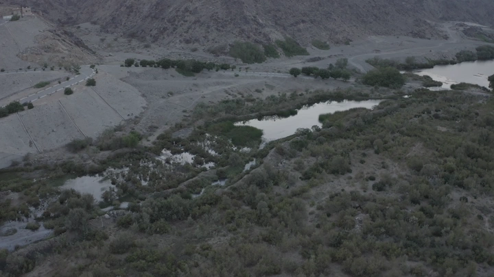 Aerial view of Wadi Bisha Dam in Asir region, daytime shot.