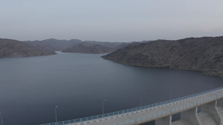Bisha Valley Dam in Asir region, aerial shot at dusk.