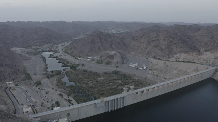 Bisha Valley Dam in Asir region, aerial view at dusk.