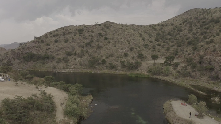 Dhubai Dam in Abha between mountains, aerial shot.