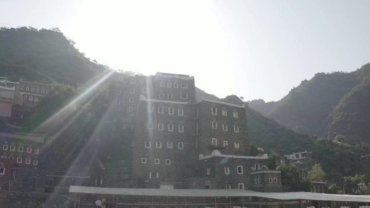 Traditional buildings in Rijal Alma in the Asir region, aerial shot.