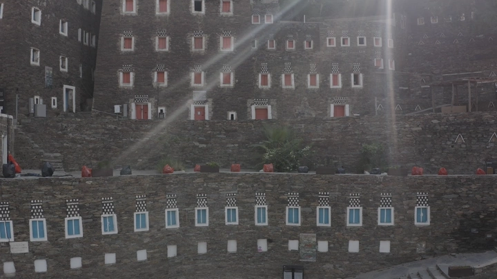 Traditional stone buildings in Rijal Almaa, Asir, daytime shot.