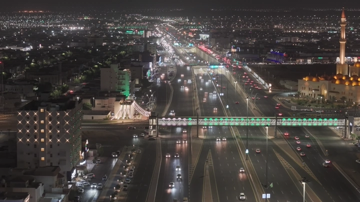 Al-Rajhi Mosque and King Fahd Road Tunnel in Hail at night, aerial shot.