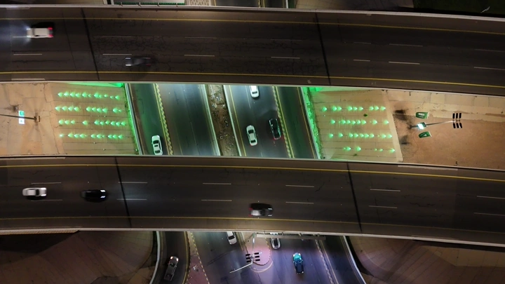 Bridges and roads in the city of Hail at night, an aerial shot.