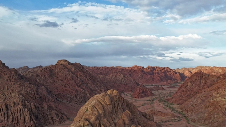 Ajja Mountains under clouds in Hail, drone shot.
