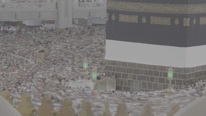 Kaaba in the center of the Grand Mosque during Tawaf, aerial shot.