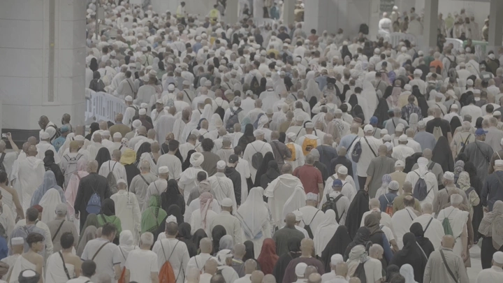 Crowd of pilgrims at the Grand Mosque in Mecca, rear shot.