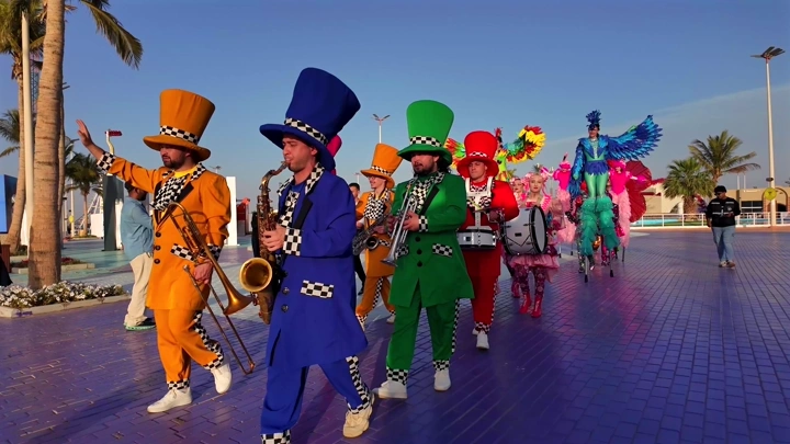 A colorful musical band at the Flowers and Gardens Festival in Yanbu Industrial City.