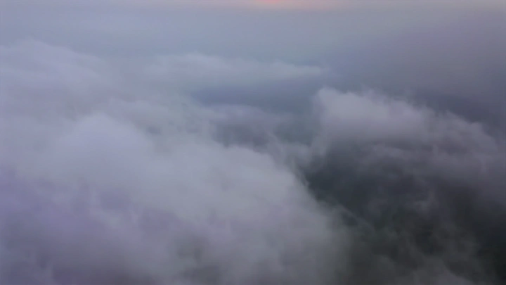 Fog covers the Black Mountains in Jazan, aerial shot.