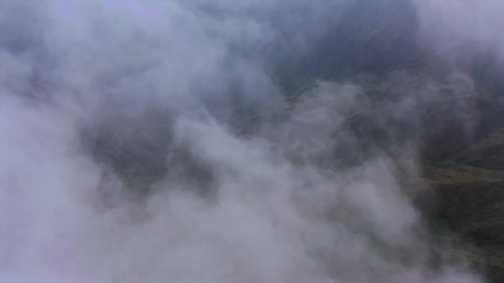 Thick fog covering Talan Mountains in Jazan, aerial shot.