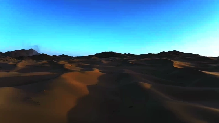 صحراء رملية عند الغروب، لقطة جوية.